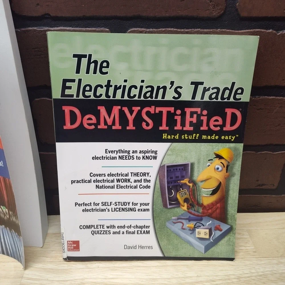 Electricians exam study guide and Trade demystified books school educate